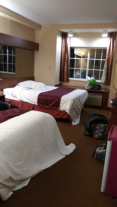 Travelers Inn and Suites Raleigh — photo 1
