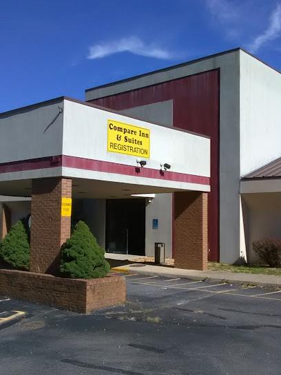 Compare Inn & Suites — photo 1